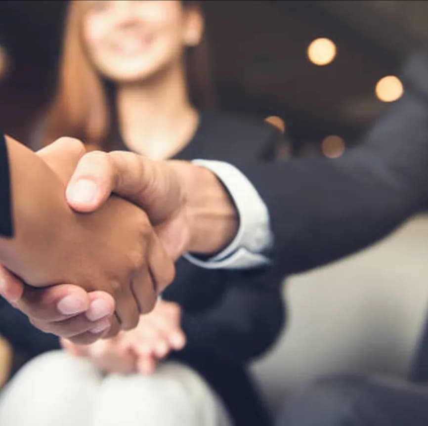 Professional handshake representing Konvart partnership