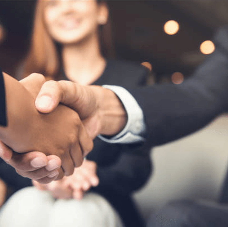 Professional handshake representing Konvart partnership